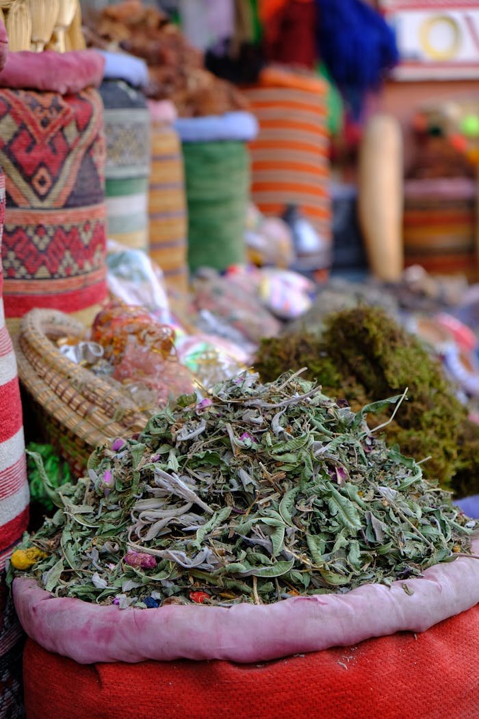 Lively Moroccan market scene showcasing vibrant spices and textures, offering a cultural glimpse into local trade.